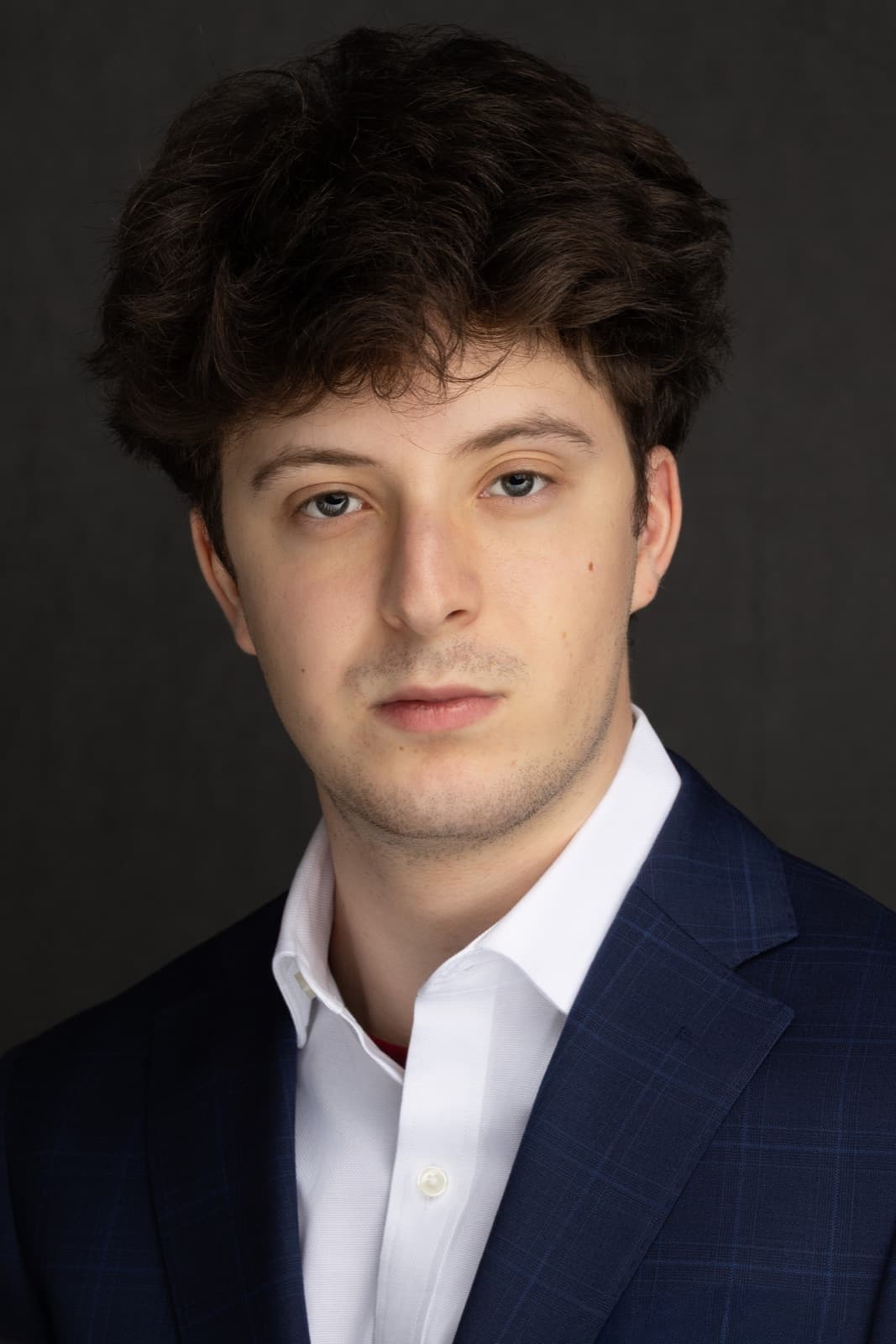 Studio headshot of a man by Portraits by Olga