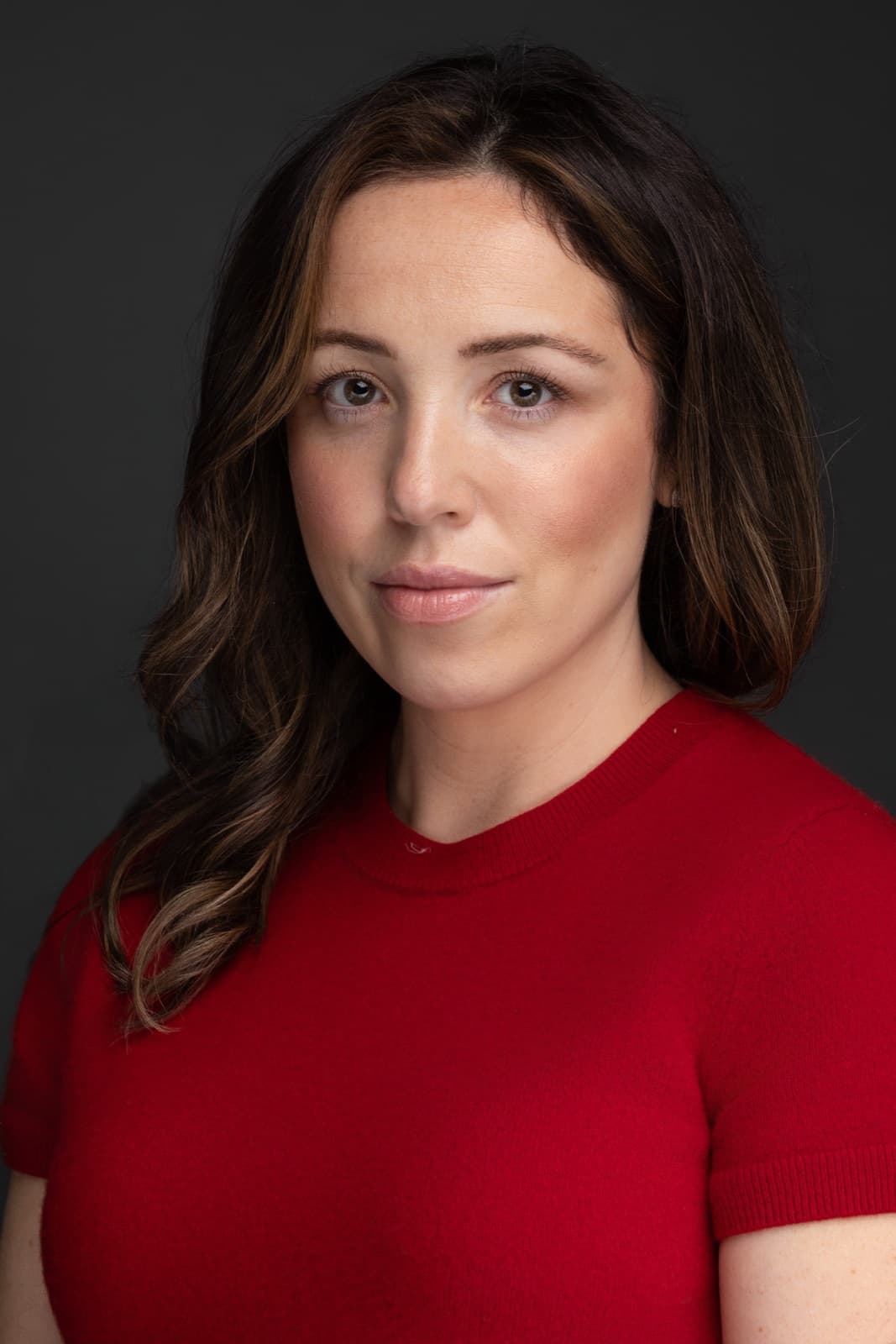 Studio headshot of a woman by Portraits by Olga
